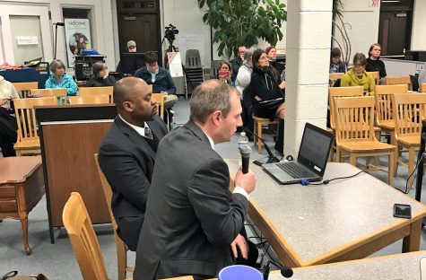 Burlington School District Finance Director Nathan Lavery explains the proposed FY18 budget alongside Superintendent Yaw Obeng, during a meeting on Jan. 10 at Hunt Middle School.