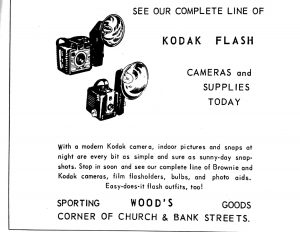 A 1939 advertisement let readers know that Woods Sporting Goods carried a complete line of Kodak flashes.