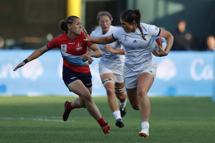 USAs Ilona Maher fends off the Russia defense on day one of the Rugby World Cup Sevens 2018 at AT&T Park in San Francisco on 20th July, 2018. Photo credit: Mike Lee - KLC fotos for World Rugby