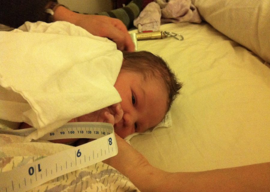 My baby sister sara getting weighed and measured after being born at home.            Photo: Courtesy David Conner 