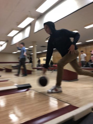 Julius Dodson rolls the bowling ball on the lane.
Photo: Jenna Peterson 