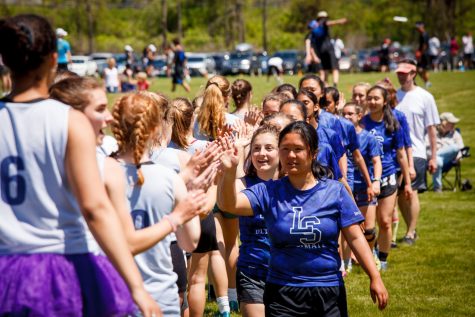 BHS high fives their opposing team after a spirited game of ultimate frisbee.
Photo: Brian MacDonald 