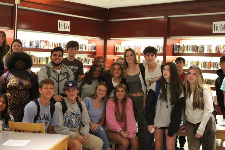 The newly formed student government meets in the library.