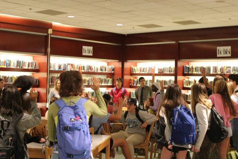 The newly formed student government meets in the library.