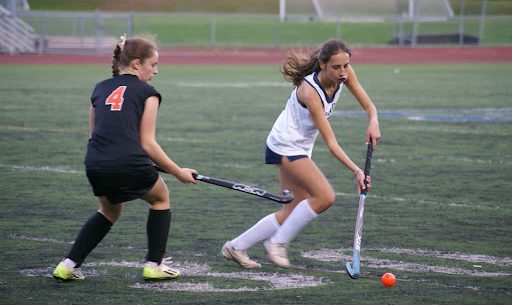Lola Rubin ‘24 gets past a Middlebury defender during the Seahorses 2-0 win over the Tigers on Senior Night (10/12) 
