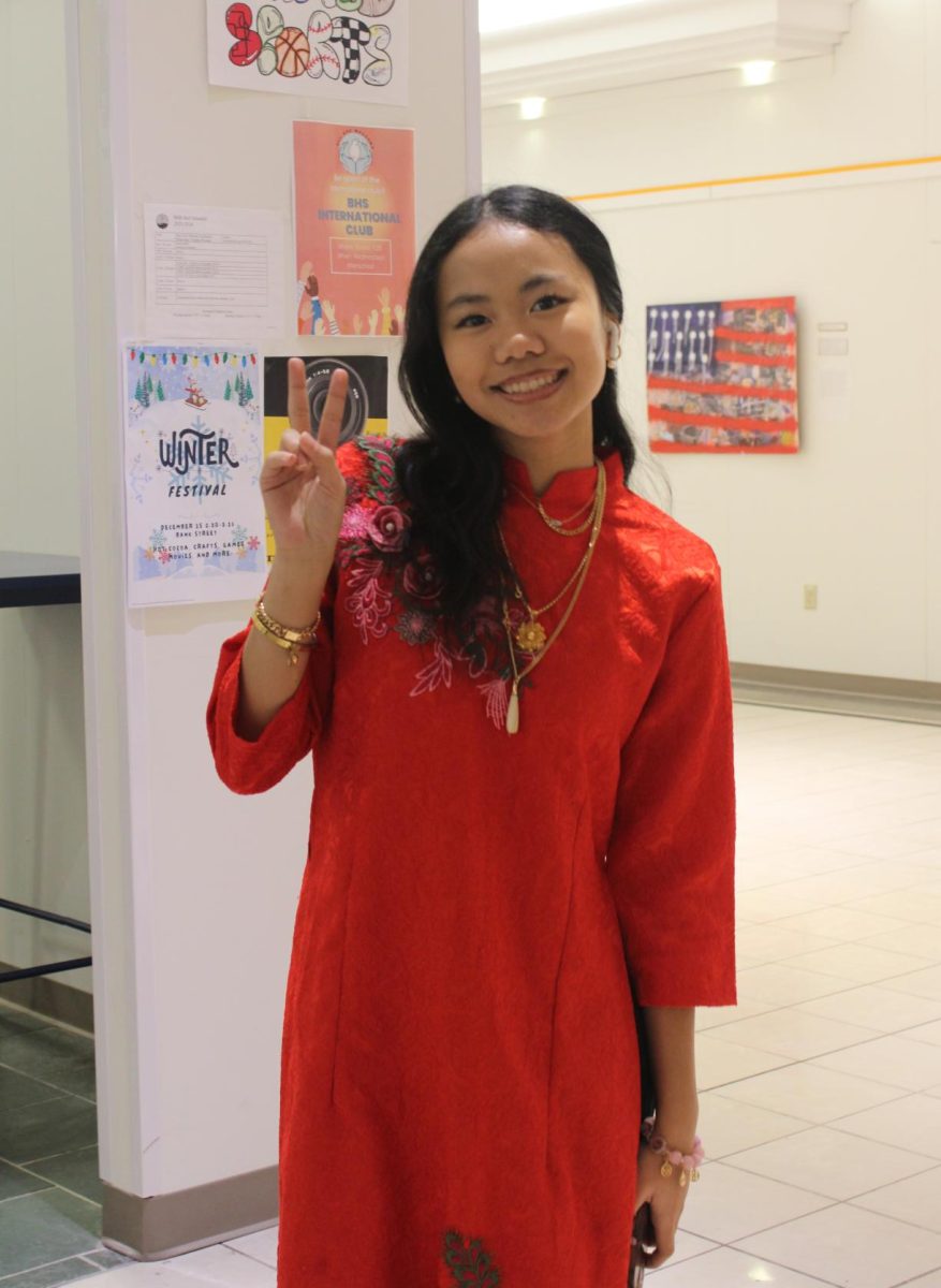 Julie Dang 27 wearing a Vietnamese ao dai on Culture Day.