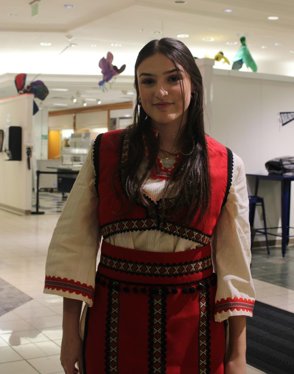 Elsa Sulejmani 25 in traditional Albanian clothing on Culture Day.