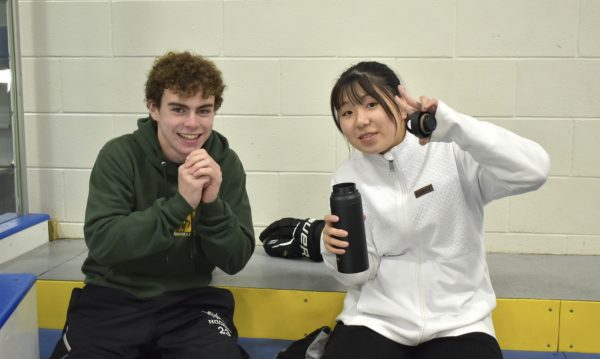 Sayre Fisher 25 at skating rink with a Japanese exchange student. 