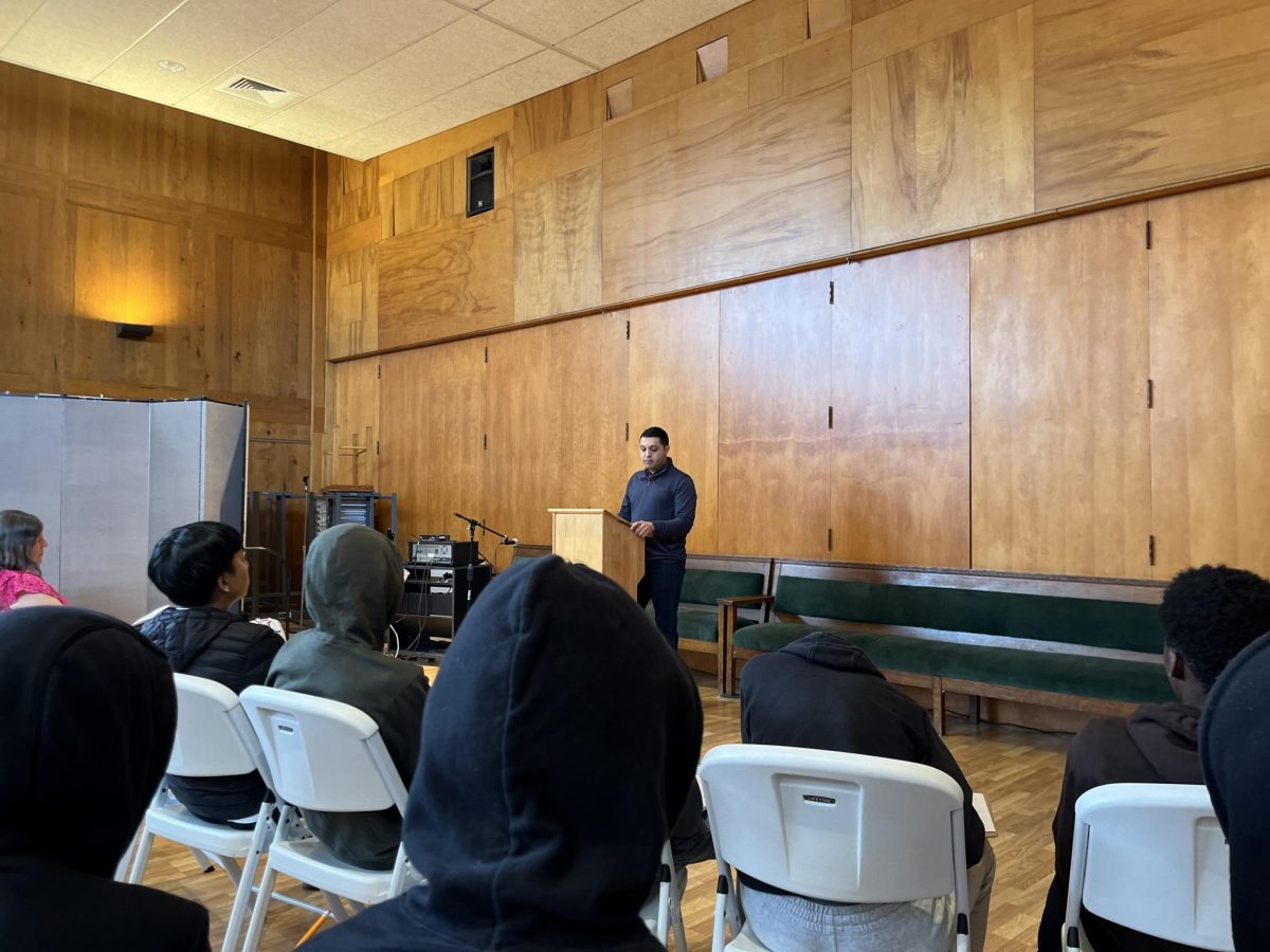 Bashir+Abdallah+speaks+about+his+Palestinian+fathers+immigration+at+the+Ohavi+Zedek+Synagogue+as+part+of+a+9th+grade+field+trip.