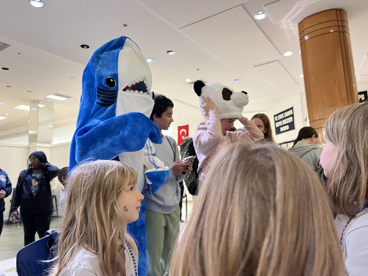 Eli Hand (in shark costume) entertains the kindergarteners from IAA. 