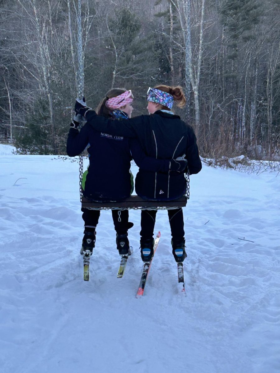 BHS Nordic skiers Miranda Brown '27 (left) and Camila Vivanco '27 (right) wearing Skida headbands.