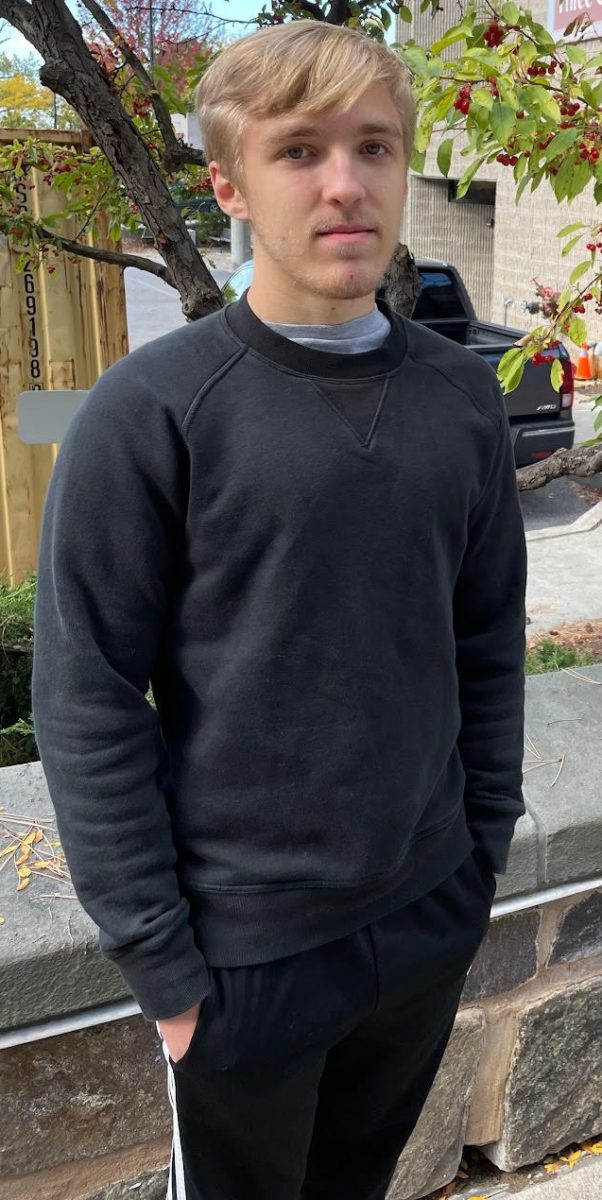 Oliver Angell standing nearby Downtown BHS