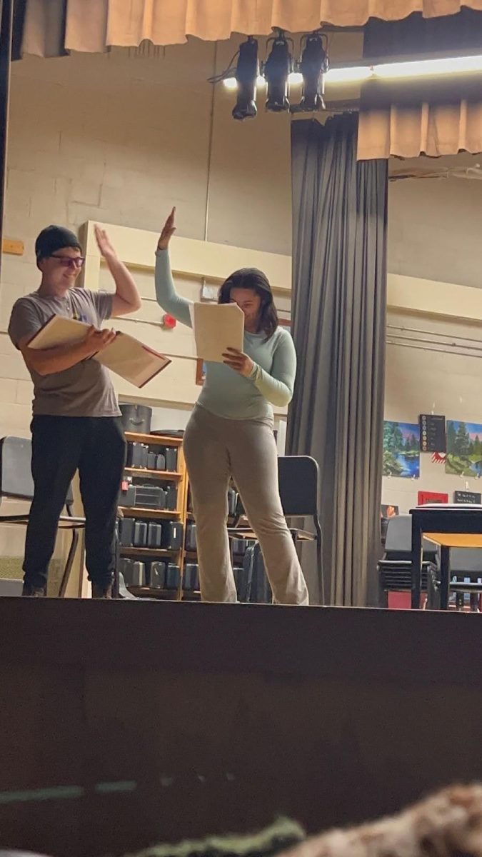 Head of BHS Drama Peter Bowley (left) and Co-Director Nadia Comba workshopping their play "The Mysterious and Shocking Case of Rick Peyton." 